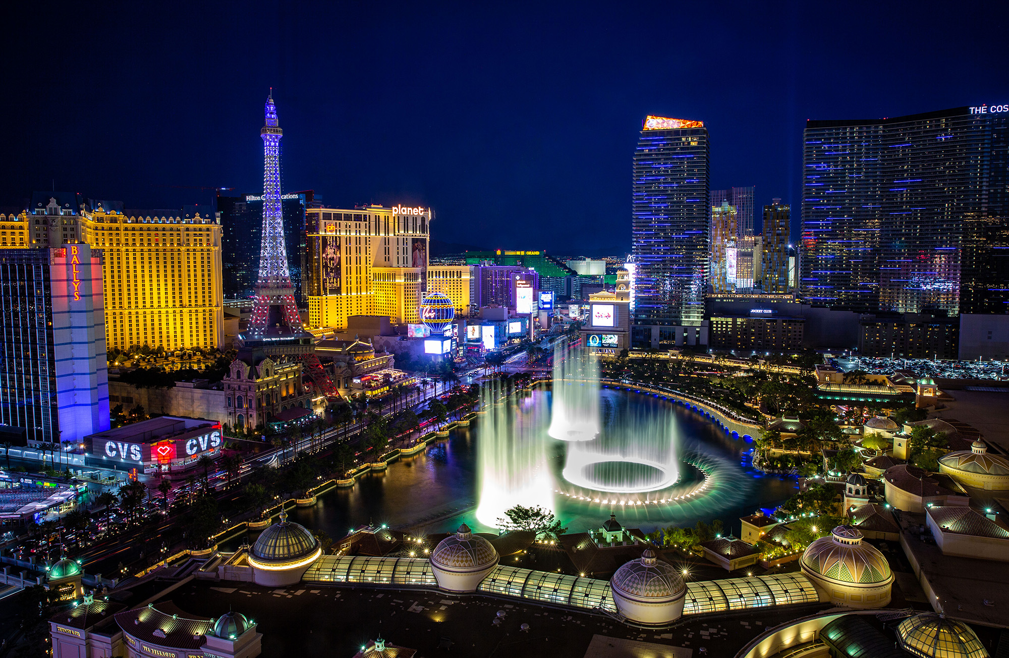 LAS VEGAS, NV - JULY 14:  The Bellagio Water Fountain Show on Las Vegas Strip is viewed from a tower at Caesars Palace Hotel & Casino on July 14, 2022 in Las Vegas, Nevada. Conventions and gamblers have once again returned in large numbers to Sin City this summer despite a surge of infections and hospitalizations due to the latest Omicron SARS-Covid BA.5 variant. (Photo by George Rose/Getty Images)